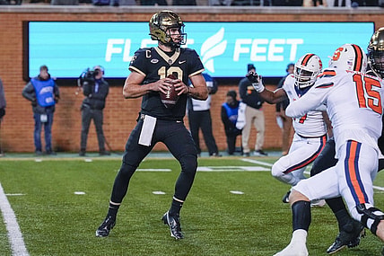 Nov 19, 2022; Winston-Salem, North Carolina, USA; Wake Forest Demon Deacons quarterback Sam Hartman (10) drops back to pass against the Syracuse Orange during the first half at Truist Field. Mandatory Credit: Jim Dedmon-USA TODAY Sports
