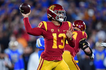 Nov 19, 2022; Pasadena, California, USA; Southern California Trojans quarterback Caleb Williams (13) throws against the UCLA Bruins during the first half at the Rose Bowl. Mandatory Credit: Gary A. Vasquez-USA TODAY Sports