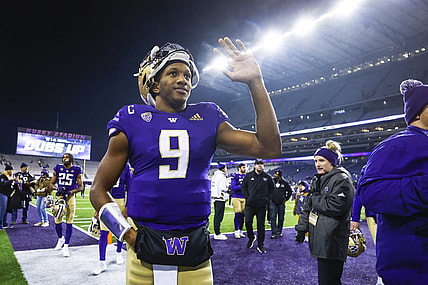 Nov 19, 2022; Seattle, Washington, USA; Washington Huskies quarterback Michael Penix Jr. (9) waves to fans while walking to the locker room following a 54-7 victory against the Colorado Buffaloes at Alaska Airlines Field at Husky Stadium. Mandatory Credit: Joe Nicholson-USA TODAY Sports