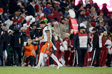 OSU's Spencer Sanders (3) walks off the field after an interception during a Bedlam college football game between the University of Oklahoma Sooners (OU) and the Oklahoma State University Cowboys (OSU) at Gaylord Family-Oklahoma Memorial Stadium in Norman, Okla., Saturday, Nov. 19, 2022. Oklahoma won 28-13.

osujournal -- print1