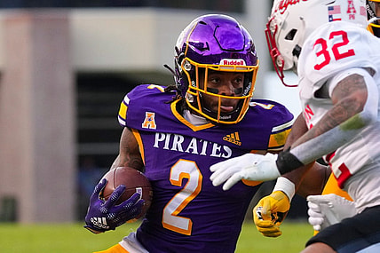 Nov 19, 2022; Greenville, North Carolina, USA;  East Carolina Pirates running back Keaton Mitchell (2) runs with the ball against the Houston Cougars during the first half at Dowdy-Ficklen Stadium. Mandatory Credit: James Guillory-USA TODAY Sports