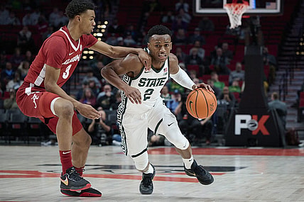 Nov 24, 2022; Portland, Oregon, USA;  Michigan State Spartans guard Tyson Walker (2) drives to the basket during the first half against Alabama Crimson Tide guard Rylan Griffen (3) at Moda Center. Mandatory Credit: Troy Wayrynen-USA TODAY Sports
