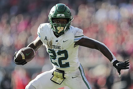 Nov 25, 2022; Cincinnati, Ohio, USA; Tulane Green Wave running back Tyjae Spears (22) runs for a touchdown against the Cincinnati Bearcats in the first half at Nippert Stadium. Mandatory Credit: Katie Stratman-USA TODAY Sports