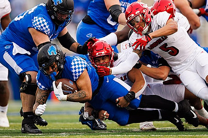 Nov 26, 2022; Lexington, Kentucky, USA; Kentucky Wildcats running back Chris Rodriguez Jr. (24) falls forward on a run during the first quarter against the Louisville Cardinals at Kroger Field. Mandatory Credit: Jordan Prather-USA TODAY Sports