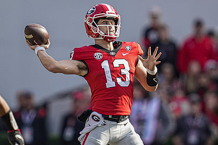 Nov 26, 2022; Athens, Georgia, USA; Georgia Bulldogs quarterback Stetson Bennett (13) passes the ball against the Georgia Tech Yellow Jackets during the first half at Sanford Stadium. Mandatory Credit: Dale Zanine-USA TODAY Sports