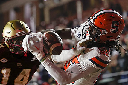 Nov 26, 2022; Chestnut Hill, Massachusetts, USA; Boston College Eagles cornerback Jalon Williams (14) breaks up a pass intended for Syracuse Orange wide receiver Damien Alford (82) during the second quarter at Alumni Stadium. Mandatory Credit: Winslow Townson-USA TODAY Sports
