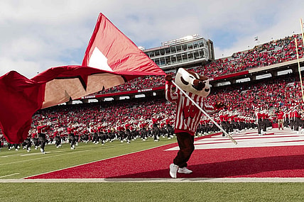 Oct 30, 2021; Madison, Wisconsin, USA;  Wisconsin Badgers mascot Bucky Badger waves the Wisconsin flag prior to the game against the Iowa Hawkeyes at Camp Randall Stadium. Mandatory Credit: Jeff Hanisch-USA TODAY Sports