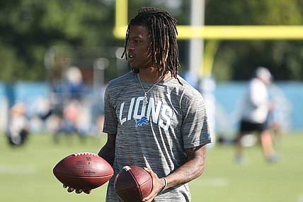 Detroit Lions receiver Jameson Williams watches passing drills during practice Thursday, July 28, 2022 at the Allen Park practice facility.

Lions1