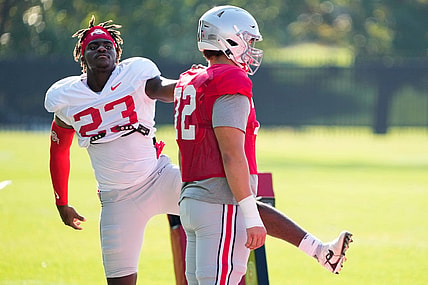 Aug 11, 2022; Columbus, OH, USA;  Ohio State Buckeyes defensive end Omari Abor (23) stretches with offensive lineman Avery Henry (72) during football camp at the Woody Hayes Athletic Center. Mandatory Credit: Adam Cairns-The Columbus Dispatch

Ohio State Football Camp