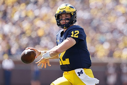 Sep 3, 2022; Ann Arbor, Michigan, USA;  Michigan Wolverines quarterback Cade McNamara (12) passes against the Colorado State Rams at Michigan Stadium. Mandatory Credit: Rick Osentoski-USA TODAY Sports