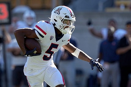Sep 24, 2022; Berkeley, California, USA; Arizona Wildcats wide receiver Dorian Singer (5) runs after a catch against the California Golden Bears during the second quarter at FTX Field at California Memorial Stadium. Mandatory Credit: Darren Yamashita-USA TODAY Sports