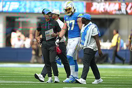 Sep 25, 2022; Inglewood, California, USA; Los Angeles Chargers linebacker Joey Bosa (97) walks off the field with Brandon Staley after suffering an injury against the Jacksonville Jaguars in the first half at SoFi Stadium. Mandatory Credit: Kirby Lee-USA TODAY Sports