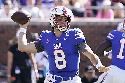 Oct 22, 2022; Dallas, Texas, USA; Southern Methodist Mustangs quarterback Tanner Mordecai (8) throws downfield during the first half against the Cincinnati Bearcats at Gerald J. Ford Stadium. Mandatory Credit: Raymond Carlin III-USA TODAY Sports
