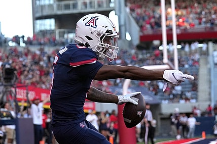 Oct 29, 2022; Tucson, Arizona, USA; Arizona Wildcats wide receiver Dorian Singer (5) reacts after being ruled out of bounds against the USC Trojans during the first half at Arizona Stadium. Mandatory Credit: Joe Camporeale-USA TODAY Sports