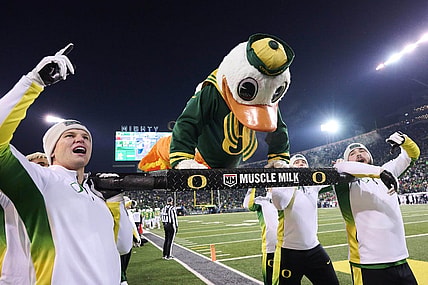Nov 19, 2022; Eugene, Oregon, USA; Oregon Ducks mascot Puddles does push ups after an Oregon touchdown during the second half against the Utah Utes at Autzen Stadium. The Ducks won the game 20-17. Mandatory Credit: Troy Wayrynen-USA TODAY Sports
