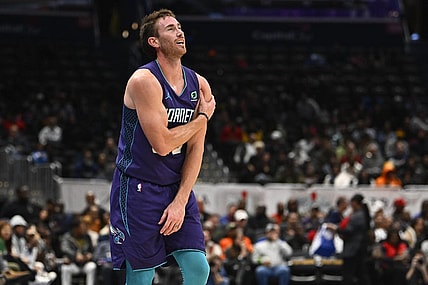 Nov 20, 2022; Washington, District of Columbia, USA; Charlotte Hornets forward Gordon Hayward (20) grabs his shoulder against the Washington Wizards during the second half at Capital One Arena. Mandatory Credit: Brad Mills-USA TODAY Sports