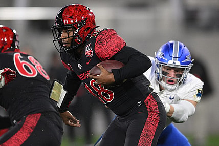 Nov 26, 2022; San Diego, California, USA; Air Force Falcons linebacker Bo Richter (8) sacks San Diego State Aztecs quarterback Jalen Mayden (18) during the second half at Snapdragon Stadium. Mandatory Credit: Orlando Ramirez-USA TODAY Sports