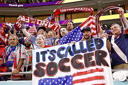 Nov 29, 2022; Doha, Qatar; United States of America fans celebrate after winning a group stage match against Iran to advance to the round of sixteen during the 2022 World Cup at Al Thumama Stadium. Mandatory Credit: Yukihito Taguchi-USA TODAY Sports