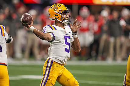 Dec 3, 2022; Atlanta, GA, USA; LSU Tigers quarterback Jayden Daniels (5) passes the ball against the Georgia Bulldogs at Mercedes-Benz Stadium. Mandatory Credit: Dale Zanine-USA TODAY Sports