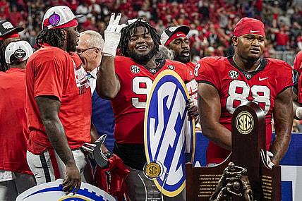 Dec 3, 2022; Atlanta, GA, USA; Georgia Bulldogs players react after defeating the LSU Tigers in the SEC Championship game at Mercedes-Benz Stadium. Mandatory Credit: Dale Zanine-USA TODAY Sports