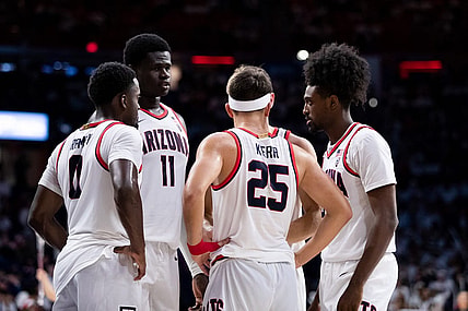Dec 4, 2022; Tucson, Arizona, USA; Arizona Wildcats guard Kerr Kriisa (25), guard Courtney Ramey (0),  center Oumar Ballo (11) and guard Cedric Henderson Jr. (45) huddle during the second half against the Cal Golden Bears at McKale Center. Mandatory Credit: Zachary BonDurant-USA TODAY Sports