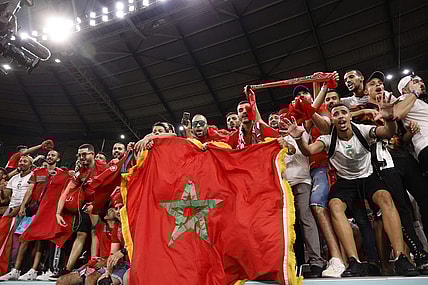 Dec 6, 2022; Ar Rayyan, QATAR; Morocco supporters celebrate the victory against Spain in penalty kicks in the round of sixteen match of the 2022 FIFA World Cup at Education City Stadium. Mandatory Credit: Yukihito Taguchi-USA TODAY Sports