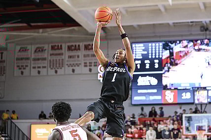 Dec 7, 2022; Queens, New York, USA; DePaul Blue Demons forward Javan Johnson (1) takes a three point shot in the first half against the St. John's Red Storm at Carnesecca Arena. Mandatory Credit: Wendell Cruz-USA TODAY Sports
