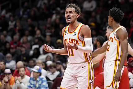 Dec 11, 2022; Atlanta, Georgia, USA; Atlanta Hawks guard Trae Young (11) reacts after being called for a foul against the Chicago Bulls during the second half at State Farm Arena. Mandatory Credit: Dale Zanine-USA TODAY Sports