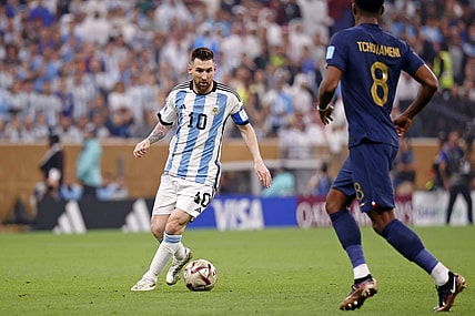 Dec 18, 2022; Lusail, Qatar; Argentina forward Lionel Messi (10) dribbles the ball against France during the first half of the 2022 World Cup final at Lusail Stadium. Mandatory Credit: Yukihito Taguchi-USA TODAY Sports