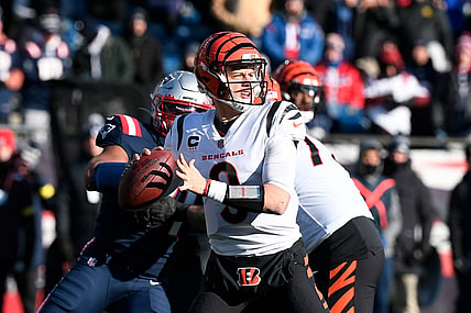 Dec 24, 2022; Foxborough, Massachusetts, USA; Cincinnati Bengals quarterback Joe Burrow (9) throws a pass against the New England Patriots during the first half at Gillette Stadium. Mandatory Credit: Eric Canha-USA TODAY Sports