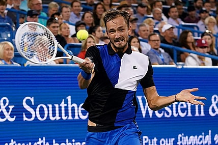 Daniil Medvedev, of Russia, returns a shot against Stefanos Tsitsipas, of Greece, during a semifinal match of the Western & Southern open tennis tournament, Saturday, Aug. 20, 2022, at the Lindner Family Tennis Center in Mason, Ohio.

Western Southern Open Tennis Tournament Aug 20 0083