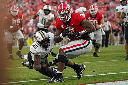 Oct 15, 2022; Athens, Georgia, USA; Georgia Bulldogs tight end Arik Gilbert (7) catches a touchdown pass behind Vanderbilt Commodores linebacker De'Rickey Wright (43) during the second half at Sanford Stadium. Mandatory Credit: Dale Zanine-USA TODAY Sports