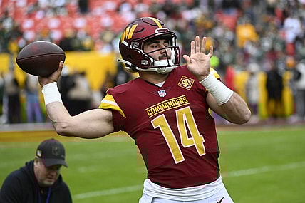 Oct 23, 2022; Landover, Maryland, USA; Washington Commanders quarterback Sam Howell (14) on the field before the game against the Green Bay Packers at FedExField. Mandatory Credit: Brad Mills-USA TODAY Sports