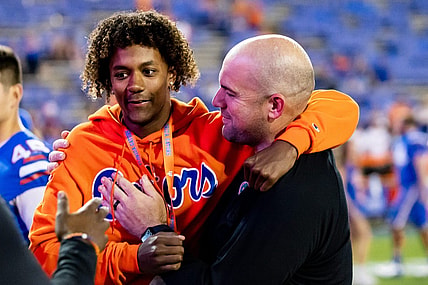 Florida Gators offensive coordinator Rob Sale hugs Florida Gators recruit Jaden Rashada after the game against the South Carolina Gamecocks at Steve Spurrier Field at Ben Hill Griffin Stadium in Gainesville, FL on Saturday, November 12, 2022. [Matt Pendleton/Gainesville Sun]

Ncaa Football Florida Gators Vs South Carolina Gamecocks