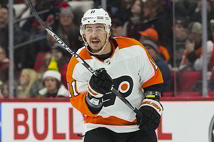 Dec 23, 2022; Raleigh, North Carolina, USA;  Philadelphia Flyers right wing Travis Konecny (11) reacts against the Carolina Hurricanes during the first period at PNC Arena. Mandatory Credit: James Guillory-USA TODAY Sports