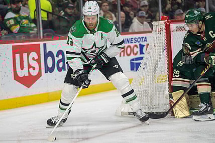 Dec 29, 2022; Saint Paul, Minnesota, USA; Dallas Stars center Joe Pavelski (16) skates behind the net defended by Minnesota Wild defenseman Jared Spurgeon (46) in the first period at Xcel Energy Center. Mandatory Credit: Matt Blewett-USA TODAY Sports