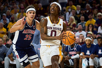 Dec 31, 2022; Tempe, Arizona, USA; Arizona State Sun Devils guard DJ Horne (0) drives for the basket as Arizona Wildcats guard Kerr Kriisa (25) pursues at Desert Financial Arena on Saturday, Dec. 31, 2022. Mandatory Credit: Alex Gould/The Republic

Basketball Asu Ua Men Bb Arizona At Arizona State