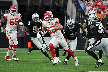 Jan 7, 2023; Paradise, Nevada, USA; Kansas City Chiefs tight end Noah Gray (83) carries the ball against the Las Vegas Raiders in the first half at Allegiant Stadium. Mandatory Credit: Kirby Lee-USA TODAY Sports