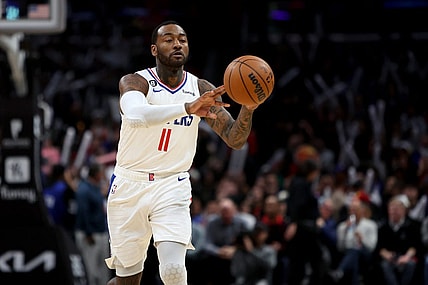 Jan 8, 2023; Los Angeles, California, USA;  Los Angeles Clippers guard John Wall (11) passes the ball during the fourth quarter against the Atlanta Hawks at Crypto.com Arena. Mandatory Credit: Kiyoshi Mio-USA TODAY Sports