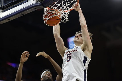 Jan 10, 2023; Charlottesville, Virginia, USA; Virginia Cavaliers forward Ben Vander Plas (5) dunks the ball as North Carolina Tar Heels forward Jalen Washington (13) looks on in the second half at John Paul Jones Arena. Mandatory Credit: Geoff Burke-USA TODAY Sports