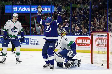 Jan 12, 2023; Tampa, Florida, USA;  Tampa Bay Lightning right wing Corey Perry (10) scores a goal against the Vancouver Canucks in the first period at Amalie Arena. Mandatory Credit: Nathan Ray Seebeck-USA TODAY Sports