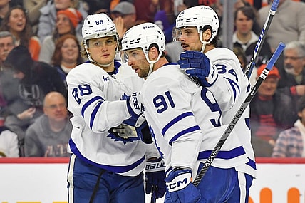 Jan 8, 2023; Philadelphia, Pennsylvania, USA; Toronto Maple Leafs right wing William Nylander (88), center John Tavares (91), and center Auston Matthews (34) celebrate a goal against the Philadelphia Flyers at Wells Fargo Center. Mandatory Credit: Eric Hartline-USA TODAY Sports