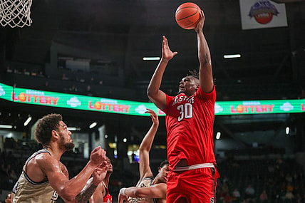 Jan 17, 2023; Atlanta, Georgia, USA; North Carolina State Wolfpack forward D.J. Burns Jr. (30) shoots against the Georgia Tech Yellow Jackets in the first half at McCamish Pavilion. Mandatory Credit: Brett Davis-USA TODAY Sports