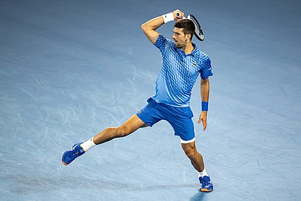 Jan 19, 2023; Melbourne, Victoria, Australia; Novak Djokovic from Serbia during his second round match against Enzo Couacaud from France on day four of the 2023 Australian Open tennis tournament at Melbourne Park. Mandatory Credit: Mike Frey-USA TODAY Sports