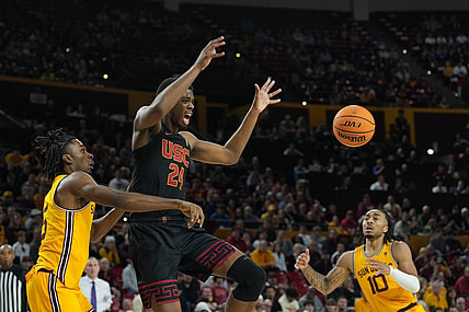 Jan 21, 2023; Tempe, Arizona, USA; Arizona State Sun Devils forward Jamiya Neal (5) fouls USC Trojans forward Joshua Morgan (24) during the first half at Desert Financial Arena. Mandatory Credit: Joe Camporeale-USA TODAY Sports
