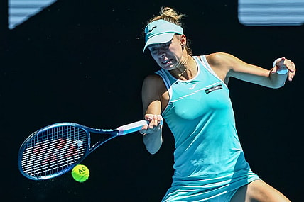 Jan 23, 2023; Melbourne, Victoria, Australia; Magda Linette from Poland during her round four match against Caroline Garcia from France on day eight of the 2023 Australian Open tennis tournament at Melbourne Park. Mandatory Credit: Mike Frey-USA TODAY Sports