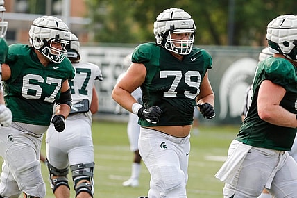 Michigan State offensive tackle Jarrett Horst (79) runs off the field after a drill Wednesday, Aug. 11, 2021 at the team's practice facility in East Lansing.