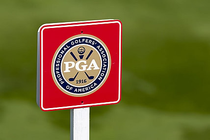 May 26, 2022; Benton Harbor, Michigan, USA; A PGA of America sign stands near the eighth tee box during the first round of the 2022 KitchenAid Senior PGA Championship at Harbor Shores. Mandatory Credit: Raj Mehta-USA TODAY Sports