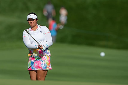 Aug 27, 2022; Ottawa, Ontario, CAN; Lilia Vu from the United States  follows the ball as she gets it onto the green of the 18th hole during the third round of the CP Women's Open golf tournament. Mandatory Credit: Marc DesRosiers-USA TODAY Sports