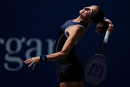 Sep 3, 2022; Flushing, NY, USA; Petra Martic of Croatia serves to Victoria Azarenka on day six of the 2022 U.S. Open tennis tournament at USTA Billie Jean King Tennis Center. Mandatory Credit: Danielle Parhizkaran-USA TODAY Sports